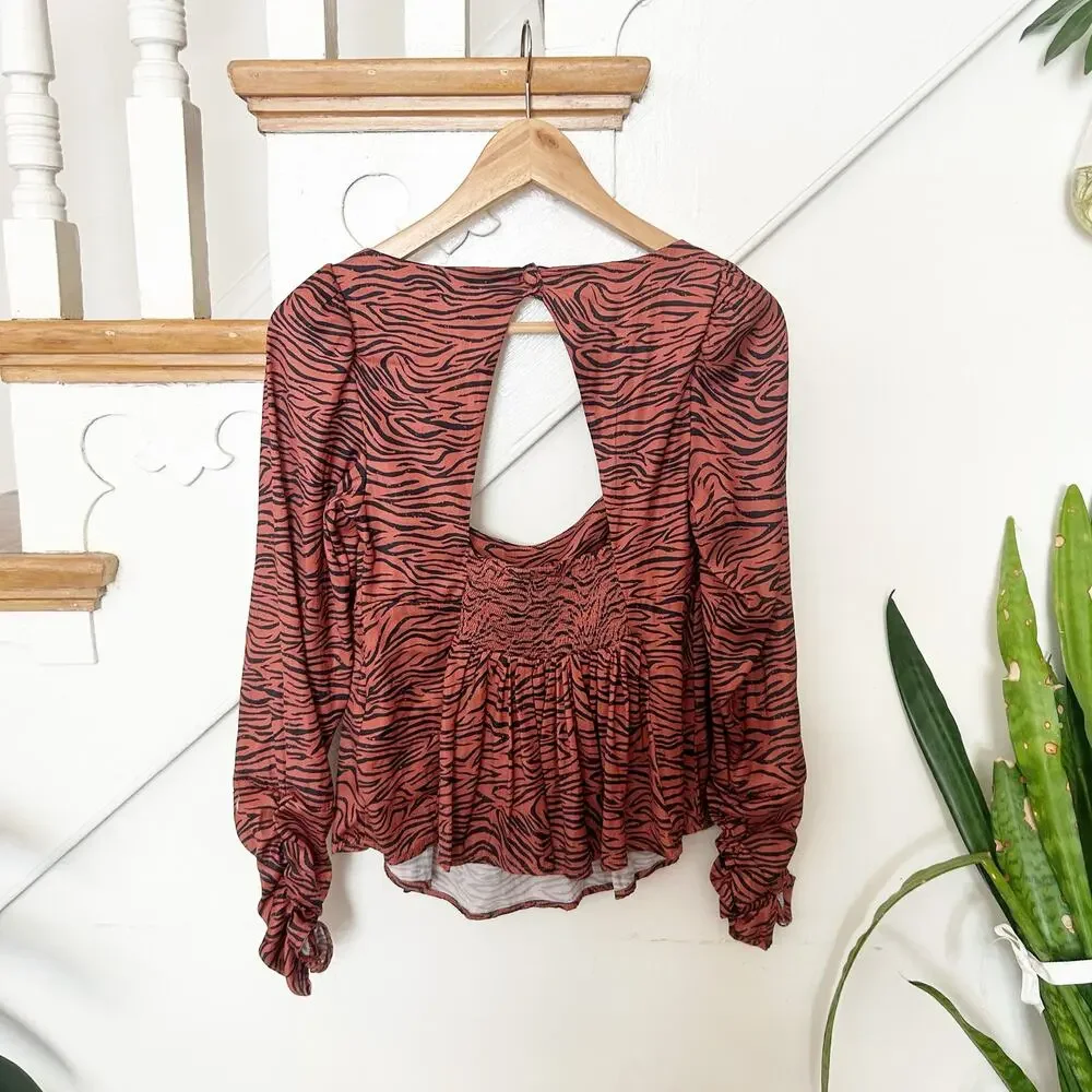 Free People Tiger Print Peplum Top Flouncy Smocked Back Long Sleeve Size XS